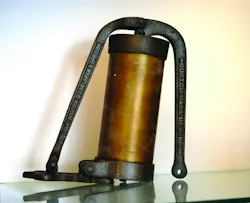 1. Early Norton closer with 'door check' engraved 1. Early Norton closer with 'door check' engraved