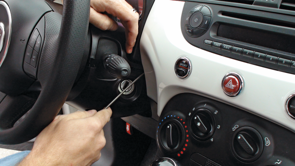 2. Two clips on either side were holding it to the bottom shroud.