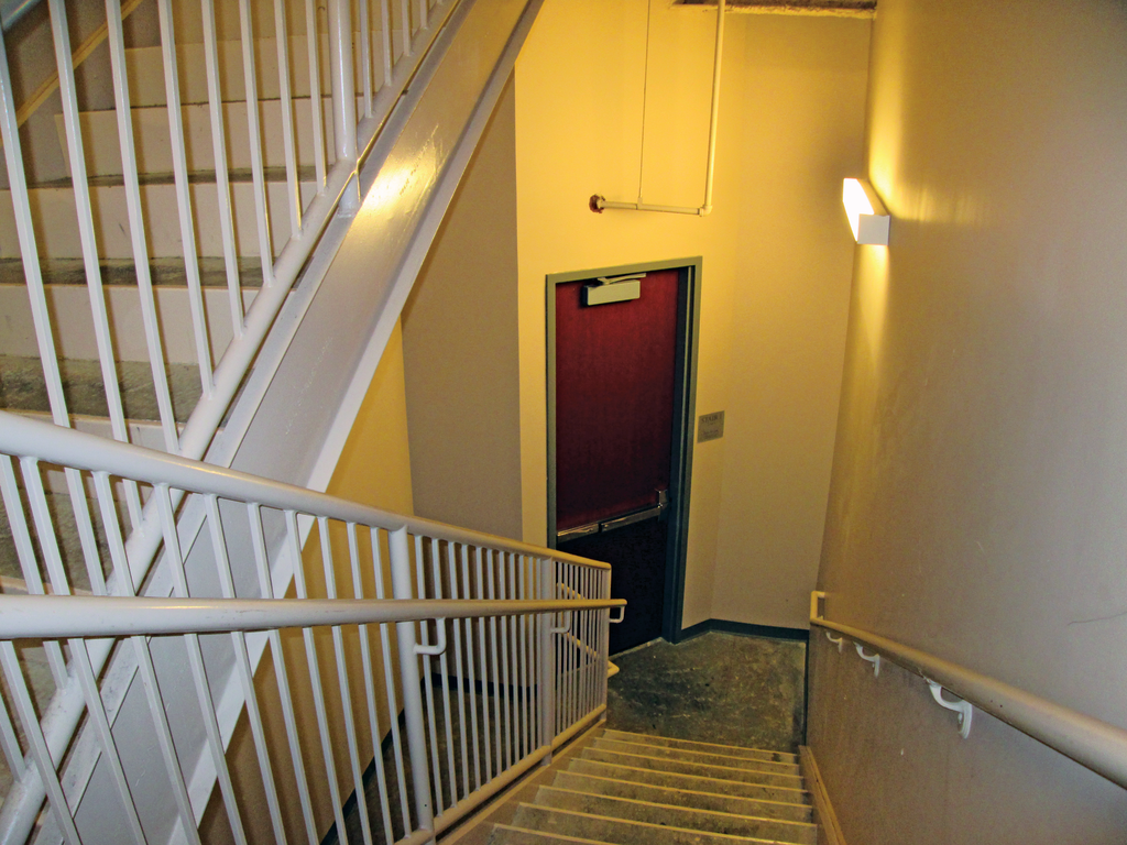 Code-compliant stairwell exit door