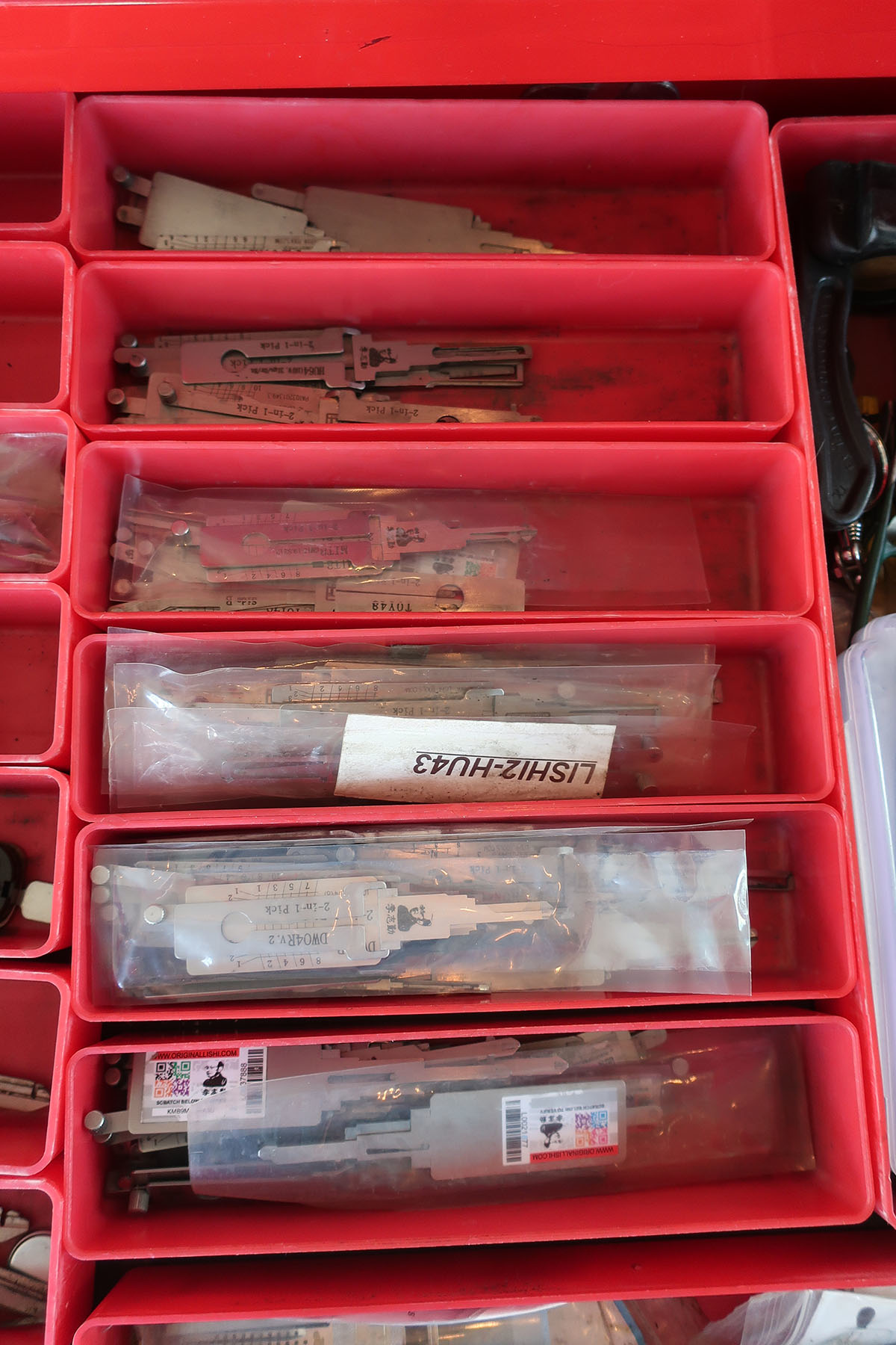 Image 2: My assortment of Lishi 2-in-1 tools is organized by how often I use them, with the most common near the front.