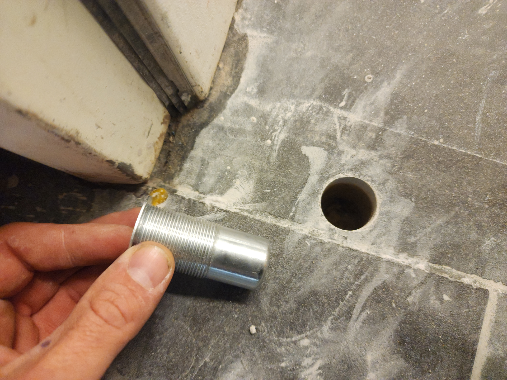 Photo 1. Installing a multi-point high security door receiver cup