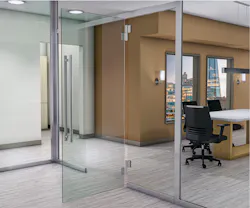 Glass provides openness and natural light in an office environment Glass provides openness and natural light in an office environment
