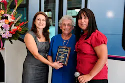 Montebello Bus Lines Assistant Director of Transporation Alva Carrasco (L) and Director of Transportation Aurora Jackson (R),congratulate Helen Cota for being the bus lines longest riding passenger. Cota has be riding the bus lines regularly for 52 years. The East Los Angeles resident rides the bus to her job at the Montebello Senior Center and to run errands. She was recognized at Montebello Bus Lines 80th Anniversary celebration. Montebello Bus Lines Assistant Director of Transporation Alva Carrasco (L) and Director of Transportation Aurora Jackson (R),congratulate Helen Cota for being the bus lines longest riding passenger. Cota has be riding the bus lines regularly for 52 years. The East Los Angeles resident rides the bus to her job at the Montebello Senior Center and to run errands. She was recognized at Montebello Bus Lines 80th Anniversary celebration.