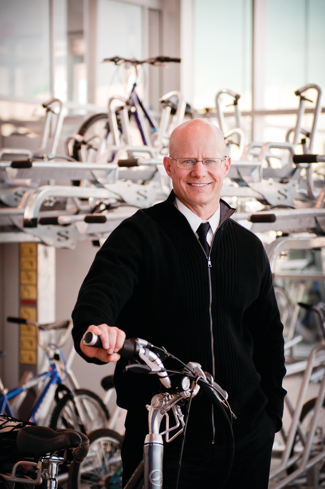 RTC General Manager Jacob Snow at the Bonneville Transit Center, which features a new bike-sharing program, showers and bike repair.