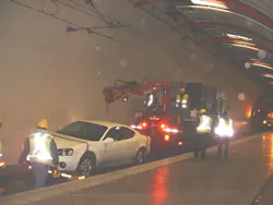 A car deep in a tunnel on the tracks at TriMet required a disruption in service while a crane car had to come and lift the car out of the ROW. A car deep in a tunnel on the tracks at TriMet required a disruption in service while a crane car had to come and lift the car out of the ROW.