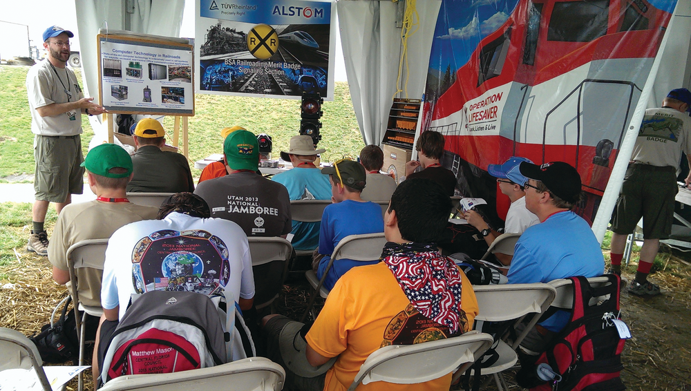 Eric Cutright, Ph.D., explains the advanced computer technology being used in the rail industry to the technology-driven generation of Scouts.