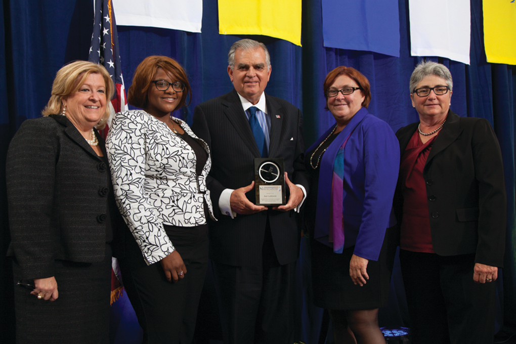 From left to right, WTS President and CEO Marcia Ferranto, Transportation YOU student Sabrina Gantt, Ray LaHood, Deputy Transportation Secretary for the NYS Governor's Office Karen Rae, WTS Chair Dana Hook, P.E.