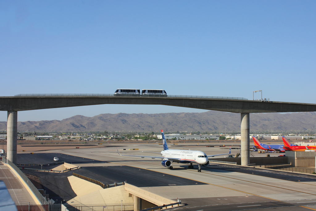 : The guideway crosses over Taxiway Romeo. The 340-foot bridge was designed with a vertical clearance height of more than 75 feet.