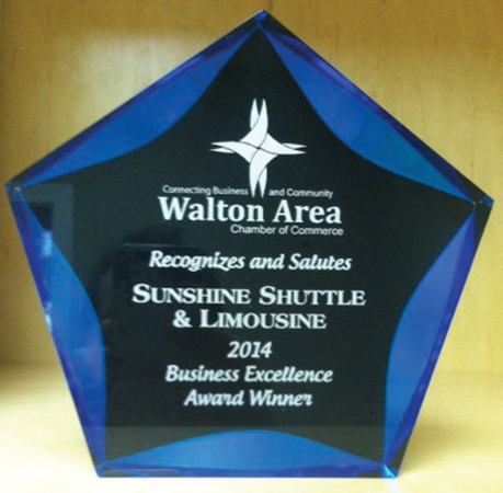 The Walton Area Chamber of Commerce presented Sunshine Shuttle & Limousine their annual Business Excellence Award.