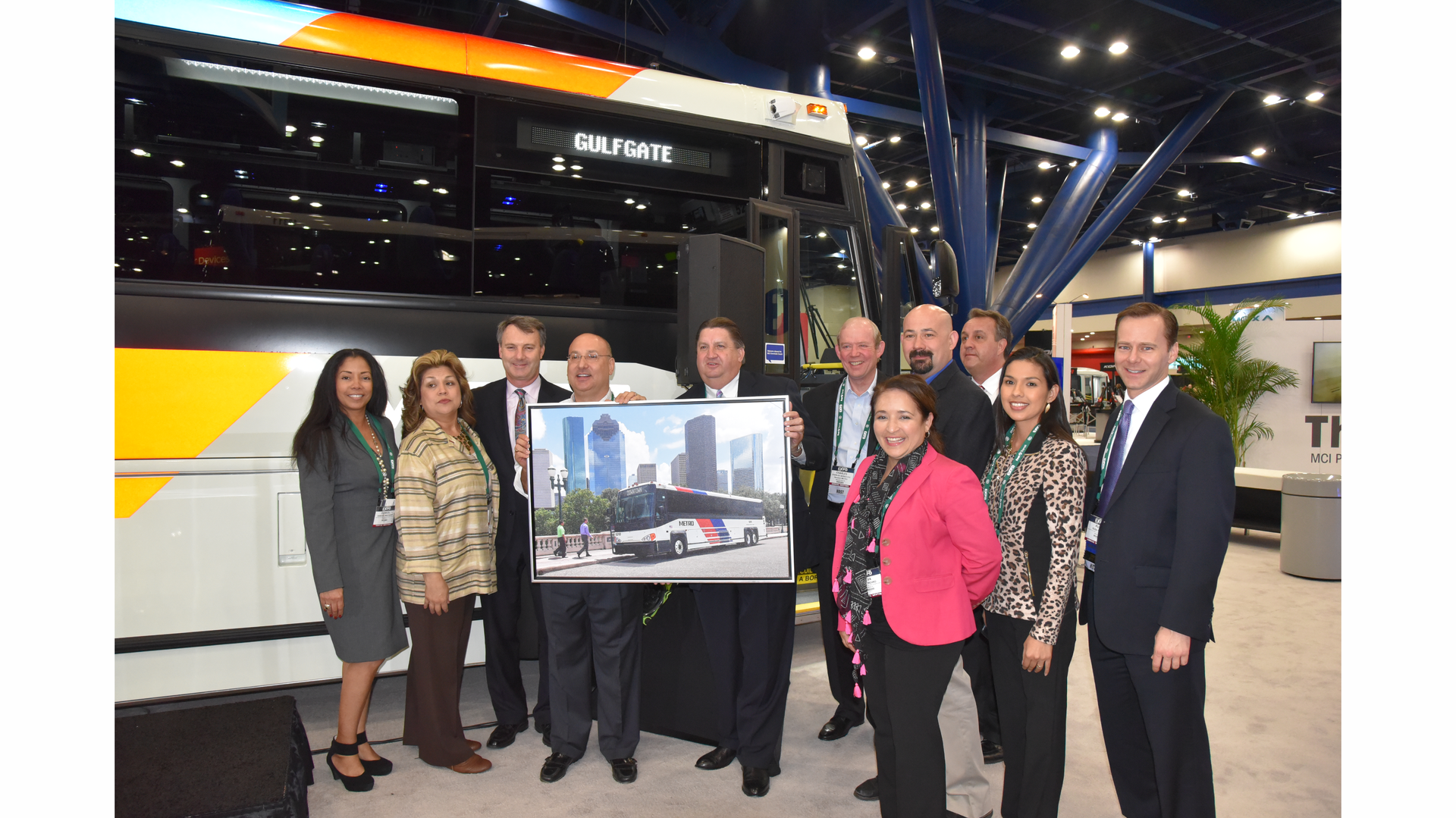 Patrick Scully, MCI executive vice president (third from left), meets with Houston Metro executives and staff in MCI&rsquo;s booth at APTA Expo.