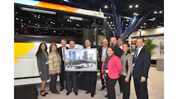 Patrick Scully, MCI executive vice president (third from left), meets with Houston Metro executives and staff in MCI’s booth at APTA Expo. Patrick Scully, MCI executive vice president (third from left), meets with Houston Metro executives and staff in MCI’s booth at APTA Expo.