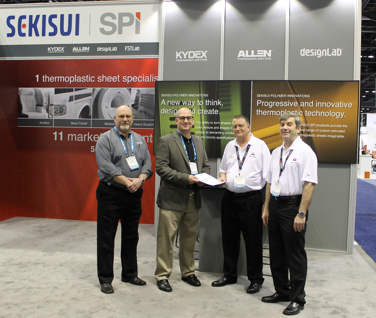 From left to right, From Sekisui SPI: Mike Karr, vice president of operations; Ronn Cort COO & president; From Milacron, Bill Boggess, senior sales engineer, extrusion; Tim Goertemiller, extrusion general sales manager.