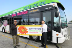Jose Vega, Fuel Cell technician and trainer, and Roland Fecteau, assistant director of maintenance, both with the fuel cell program from its inception. Behind them, Fuel Cell Bus 7, whose fuel cell has clocked 20,000 hours of service. Jose Vega, Fuel Cell technician and trainer, and Roland Fecteau, assistant director of maintenance, both with the fuel cell program from its inception. Behind them, Fuel Cell Bus 7, whose fuel cell has clocked 20,000 hours of service.