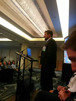 Matt Caywood, CEO of TransitScreen, addresses a crowd during the 2015 APTA Annual Meeting in San Francisco. Matt Caywood, CEO of TransitScreen, addresses a crowd during the 2015 APTA Annual Meeting in San Francisco.