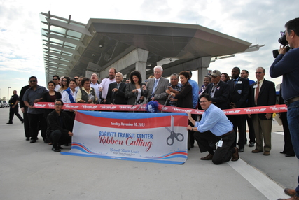 Metro Chairman Gilbert Garcia, Board members Christof Spieler, Jim Robinson and Diann Lewter, along with State Representative Carol Alvarado, Daniel Bustamante of Casa de Amigos and community members, cut the ribbon on the new Burnett Transit Center.
