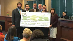 Commuter Advertising presents a check to the Greater Dayton Regional Transit Authority. Commuter Advertising presents a check to the Greater Dayton Regional Transit Authority.