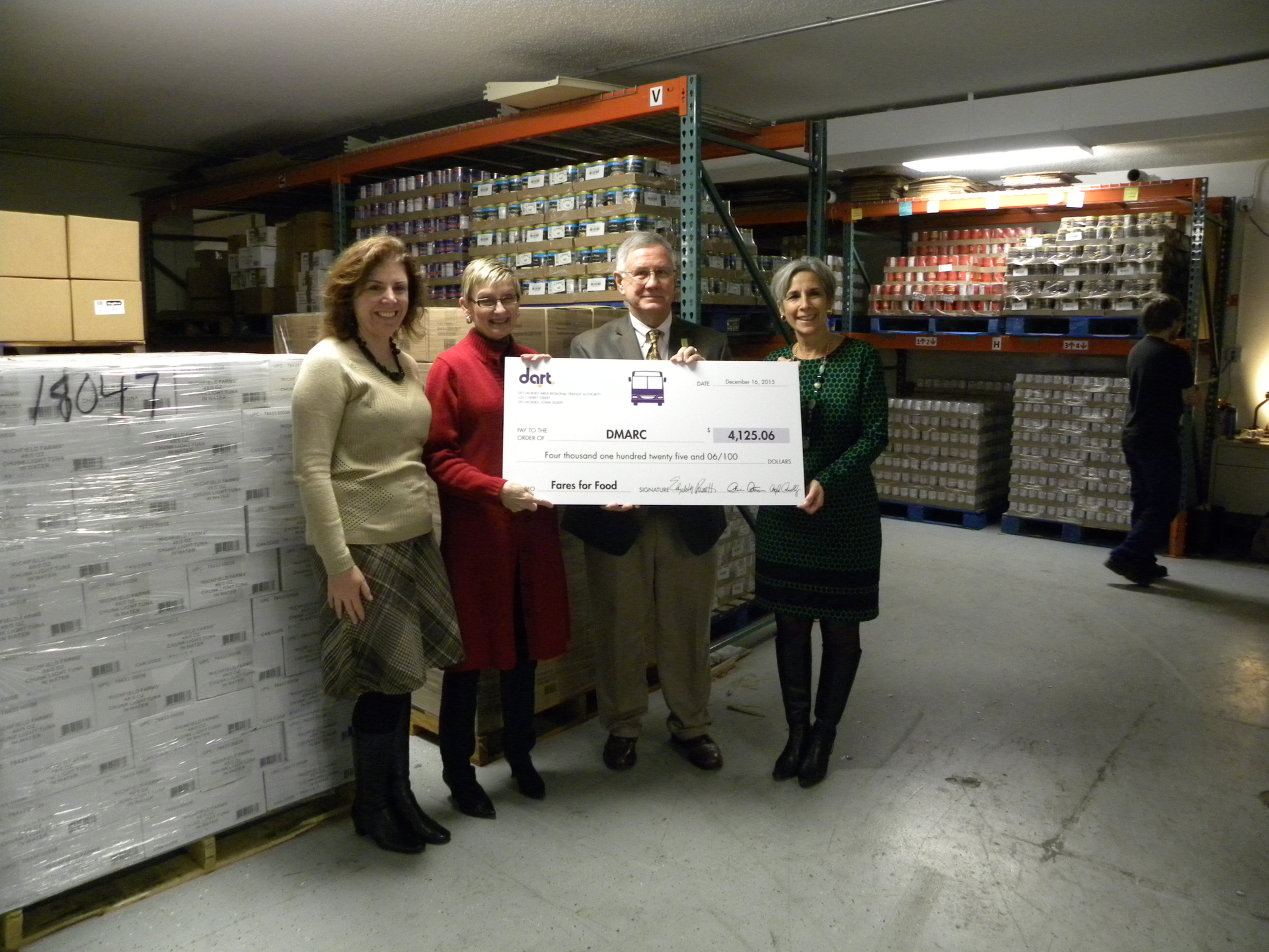 DART presents a check to the DMARC organization.