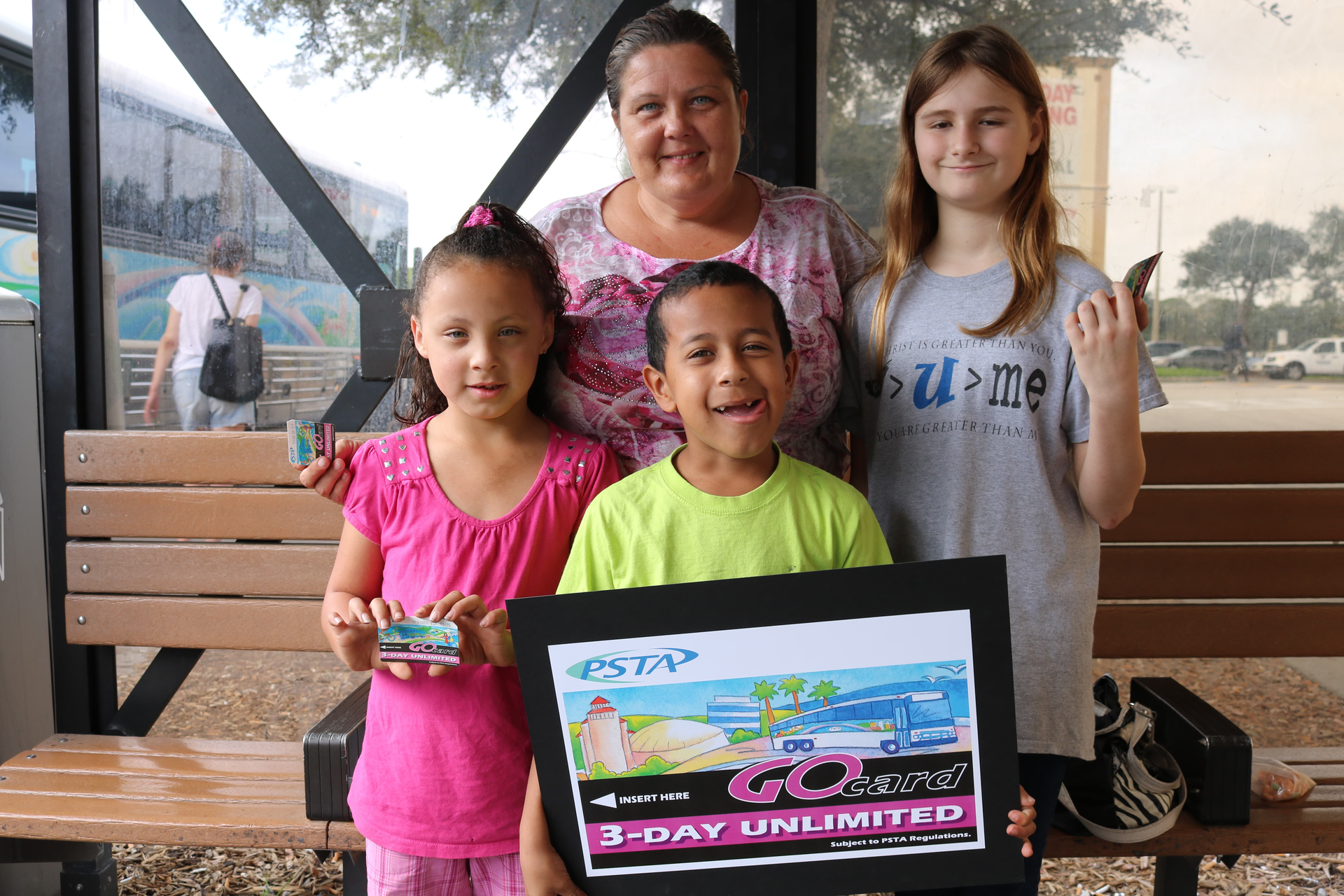 Tonya Farmer receives a free 3-Day bus pass as part of PSTA&rsquo;s new bus pass launch.