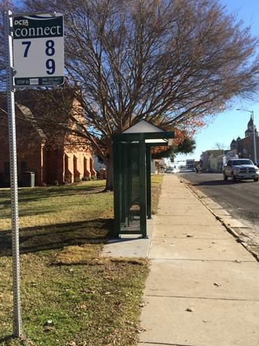 Bus shelter at Oak and Cedar.