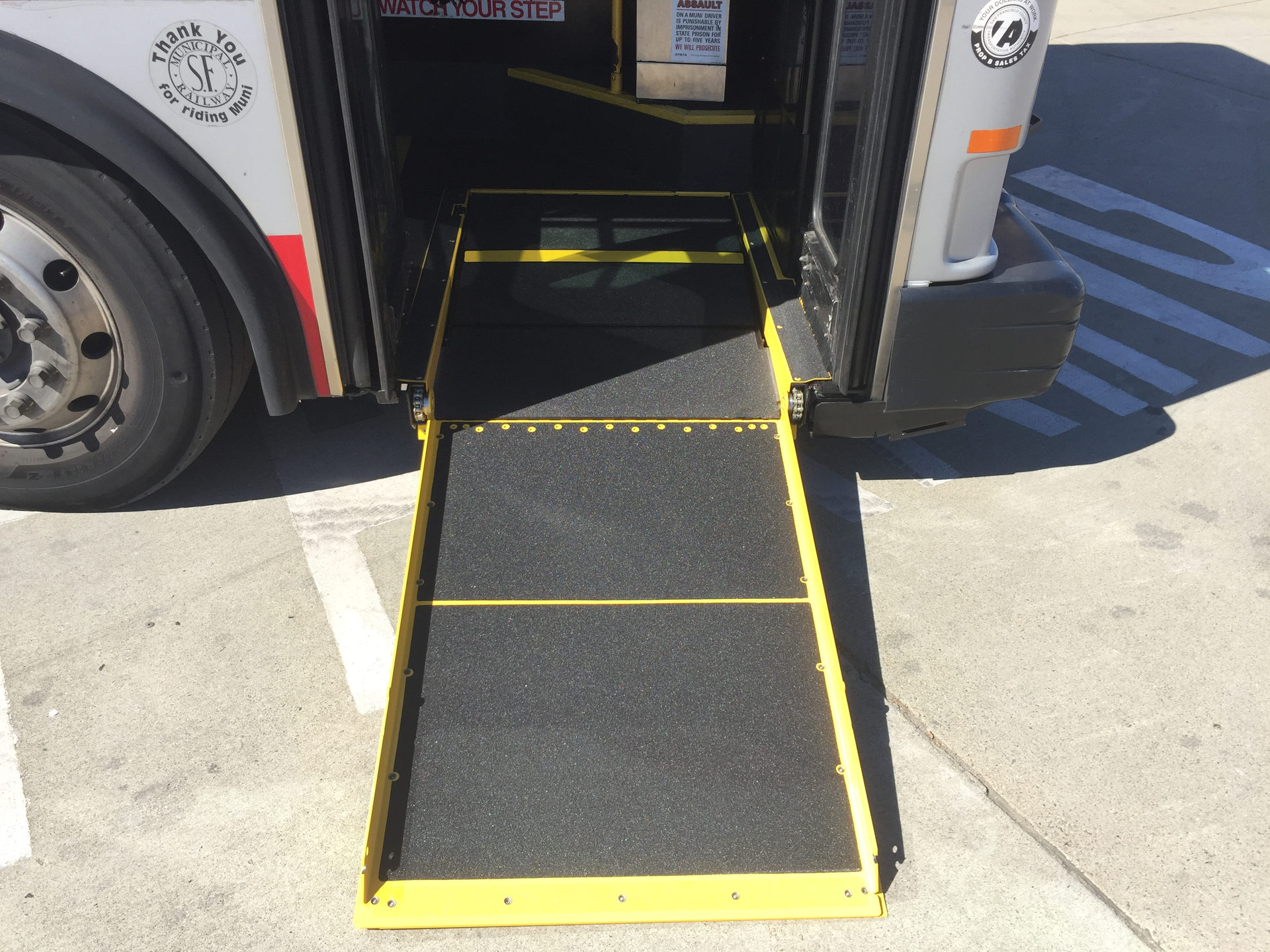 The new ramps fold flush with the floor when not in use and have a substructure that can be adjusted when the ramp is deployed to create a smooth and level surface, allowing passengers who use wheelchairs or have difficulty climbing steps to easily and safely board or exit the bus.
