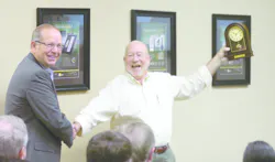 AngelTrax president Richie Howard with top sales rep Ray Fair. AngelTrax president Richie Howard with top sales rep Ray Fair.