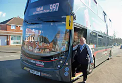 Birmingham City Councillor Keith Linnecor with a National Express Platinum bus. Birmingham City Councillor Keith Linnecor with a National Express Platinum bus.
