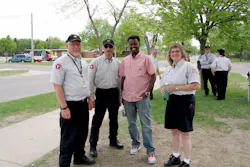 Metro Bus Fixed Route drivers visit before the competition. Shon Davis (far left) placed third. Gayle Rekowski (far right) placed first. Adam Ploof (not pictured) placed second in the large bus division. Metro Bus Fixed Route drivers visit before the competition. Shon Davis (far left) placed third. Gayle Rekowski (far right) placed first. Adam Ploof (not pictured) placed second in the large bus division.