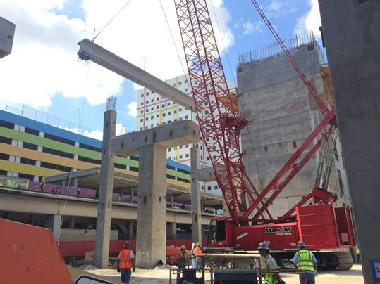 Massive concrete beams lay foundation for elevated Brightline tracks.