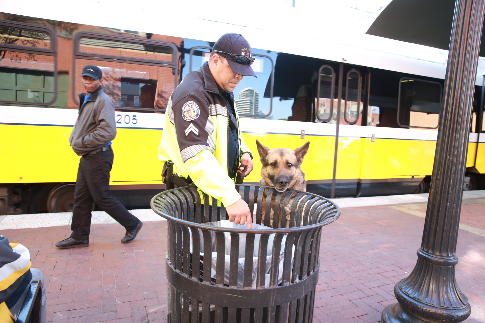 Argo with handler Corporal Mace De Los Santos, Dallas Area Rapid Transit.