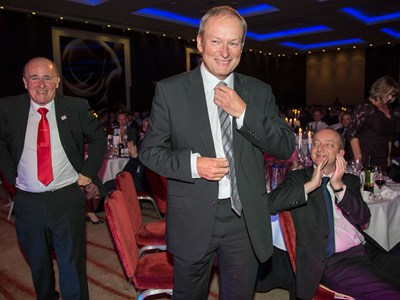 Bus driver Dave Gerrard and Managing Director Peter Coates going up to receive the National Transport Award for Bus Operator of the Year 2016.