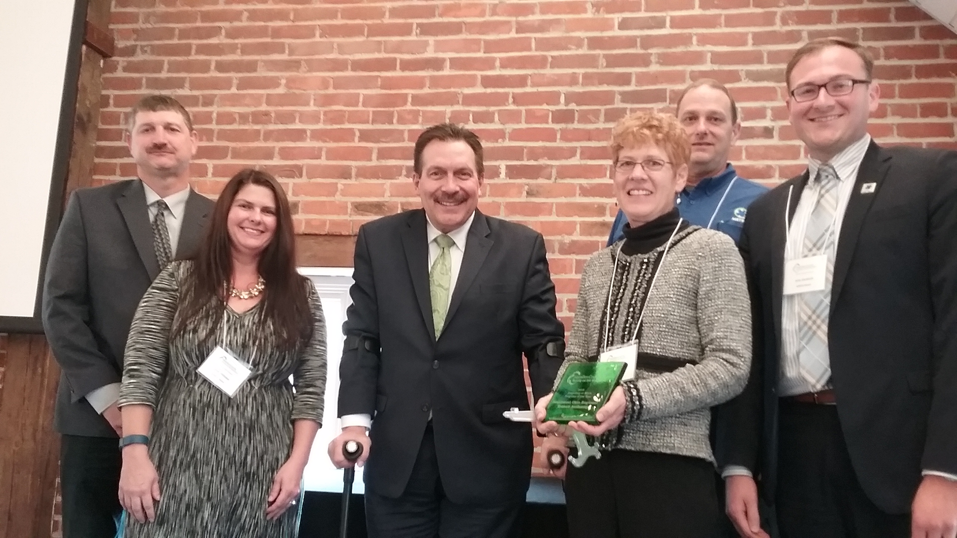 Members of Metro's Green Team pose for a photo with Hamilton County Commissioner Todd Portune (Center) after receiving the '2016 Recycle at Work Program' award (L-R): Facilities Manager Paul Williams, Buyer Lyndi Whiteker, Outreach & Sustainability Manager Kim Lahman, Facility Maintenance Supervisor Bill Haley and Service Analyst John Gardocki.