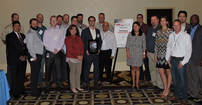 Representatives from Valley Metro, city of Phoenix, AECOM and Sundt/Stacy and Witbeck Joint Venture accept the Southwest&rsquo;s 2016 Best Airport/Transit Project of the Year award for the Northwest light rail extension.