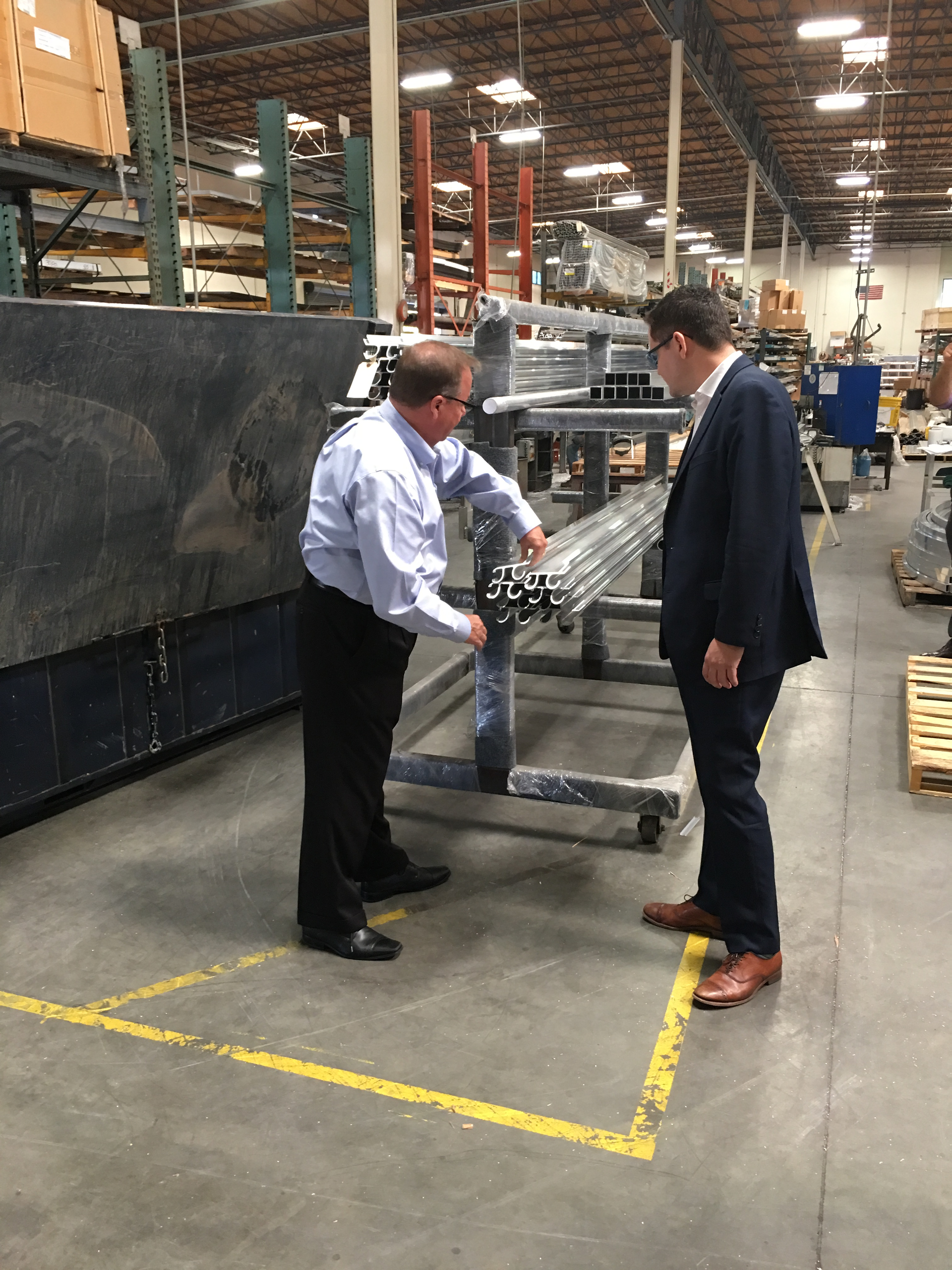 Executive Vice President Patrick Merrick and Assembly Member Eric Linder on the tour.