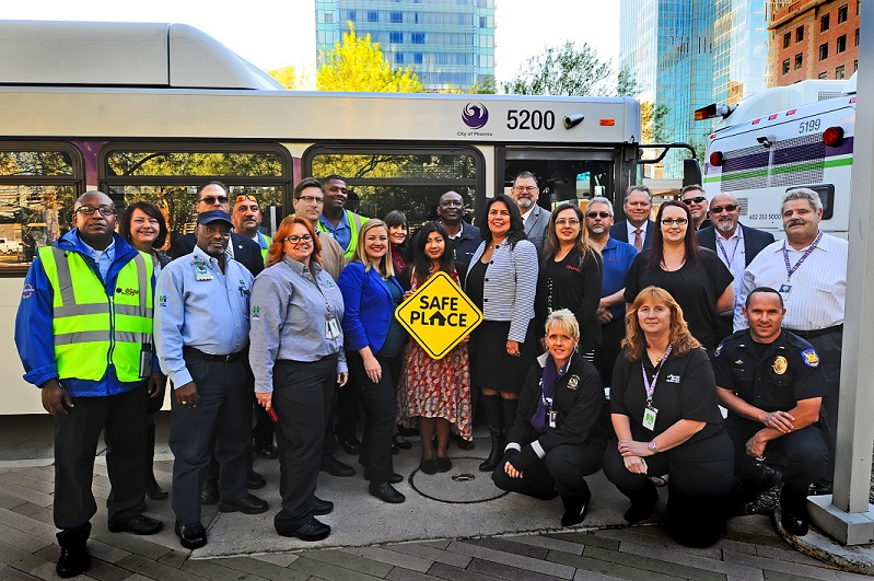 Phoenix Mayor Greg Stanton, Phoenix Vice Mayor Kate Gallego and Phoenix Councilmember Laura Pastor along with representatives from Valley Metro, City of Phoenix, Tumbleweed Center for Youth Development, Transdev, First Transit and Allied Universal celebrate the expansion of Safe Place to Valley Metro and Phoenix buses.