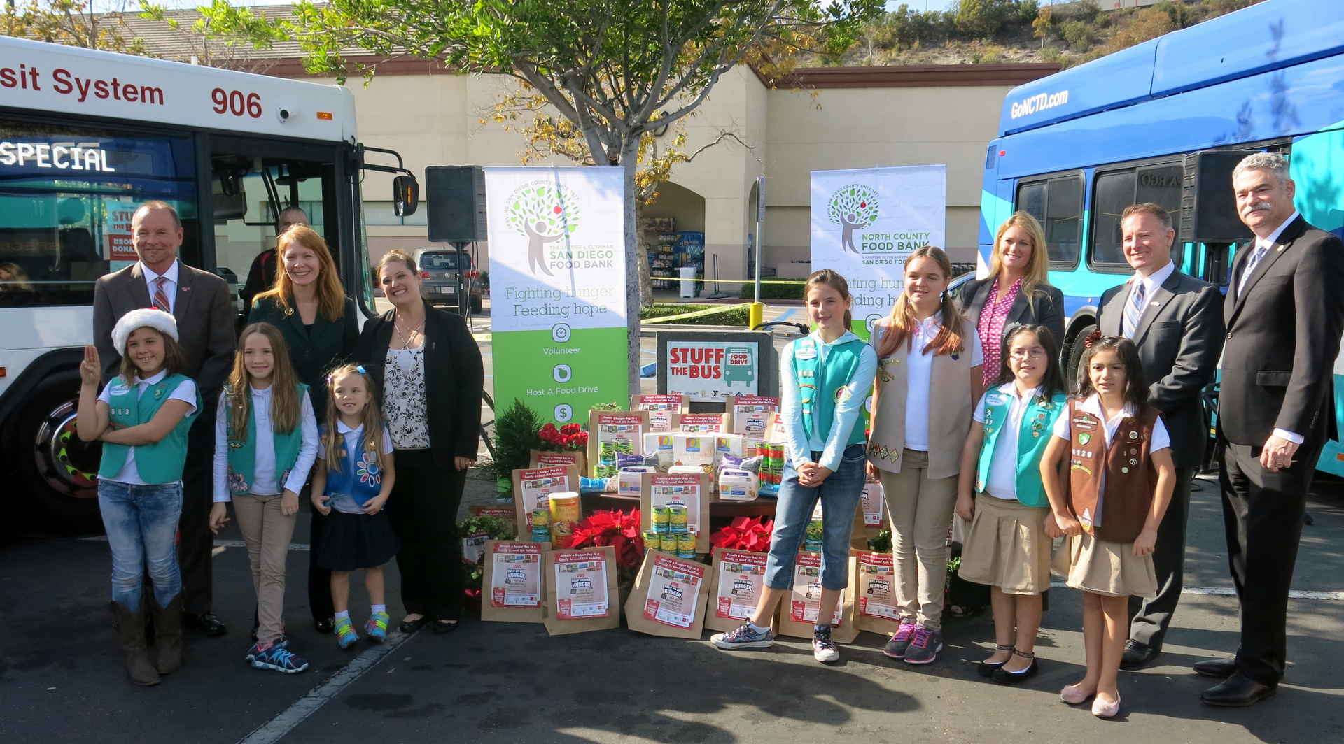 Photo (L to R): Back Row &ndash; MTS Bus Chief Operating Officer Bill Spraul; CEO of Girl Scouts San Diego Carol Dedrich; Manager of External Communications and Community Relations for Albertsons, Vons and Pavilions Jenna Watkinson; NCTD Manager of Marketing & Communications Kimy Wall; Armed Service YMCA Executive Director Tim Ney; Jacobs & Cushman San Diego Food Bank President & CEO Jim Floros. Front Row &ndash; San Diego Girl Scouts.