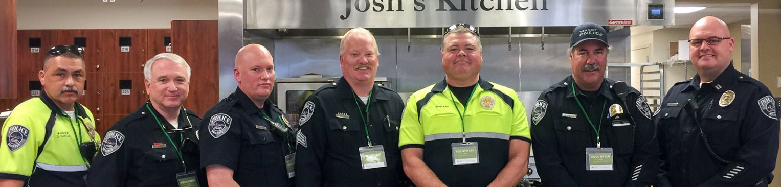 UTA officers volunteered at Josh's Kitchen.