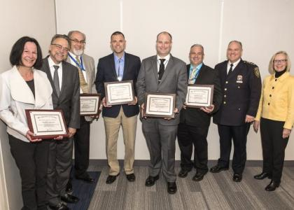 (Left to Right) Michele Salvatore, Metro-North President Joseph Giulietti, Jeff Ballard, Jeffrey Boyle, Andrew McClellan, Brendan Szabo, MTA Police Chief Owen Monaghan, MTA Board's Metro-North Railroad Committee Chair Susan Metzger.