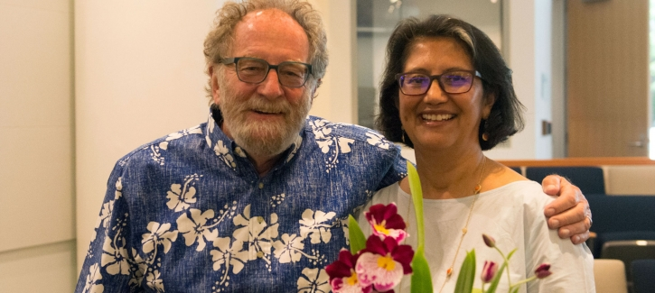MTC Chair Jake Mackenzie presents MTC Senior Public Information Officer Catalina Alvarado with some flowers at the May 24, 2017 Commission meeting.