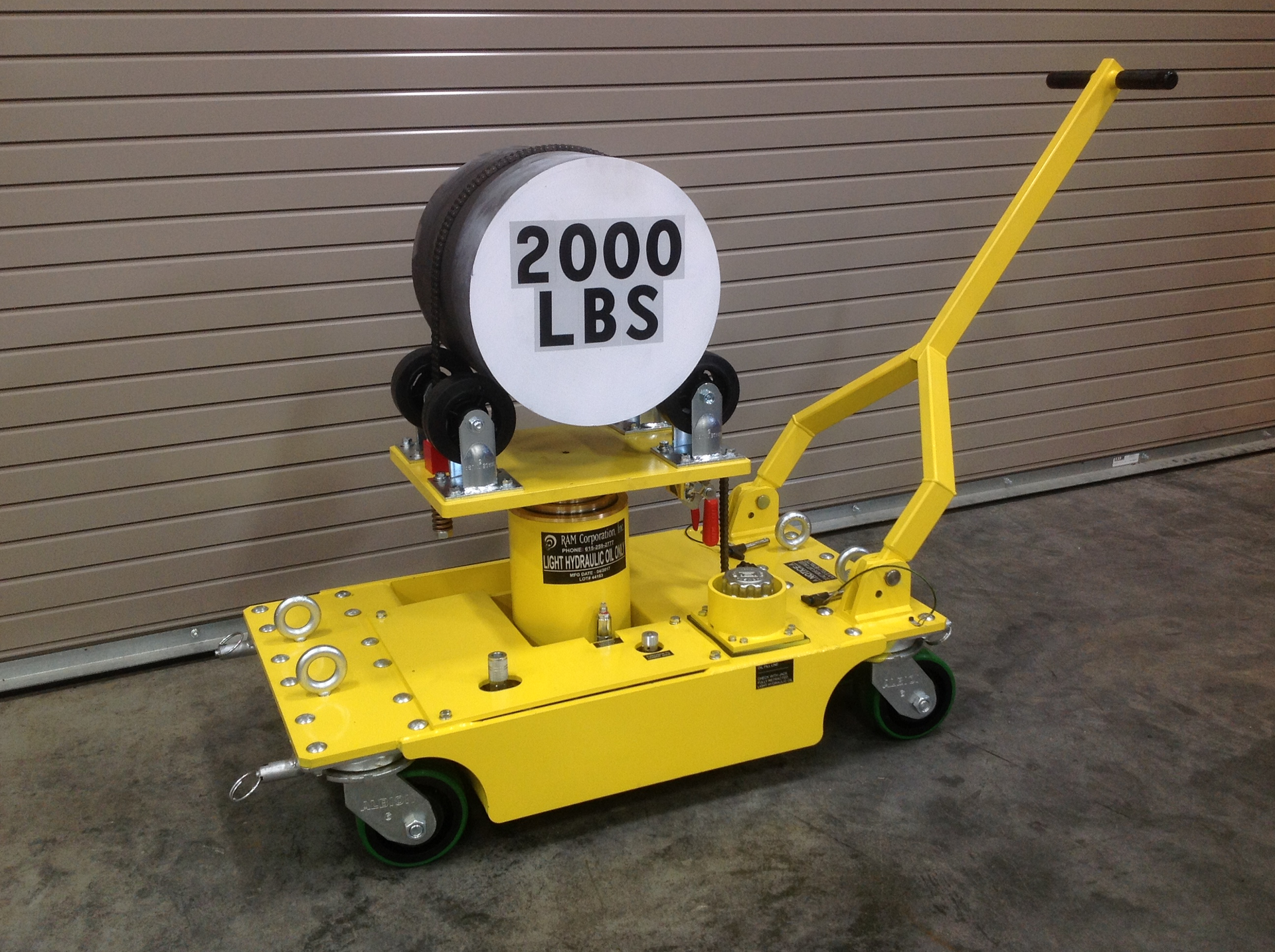 Tower Jack lowered with handle at angle.