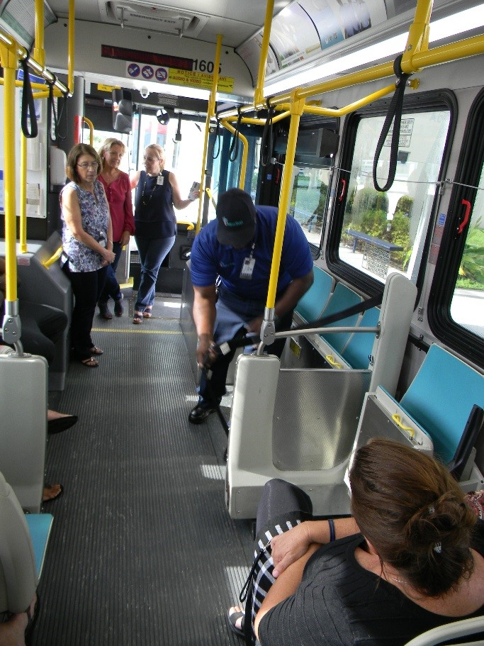 Educators learn about wheelchair restraints on Palm Tran buses at a workshop on October 7, 2017.