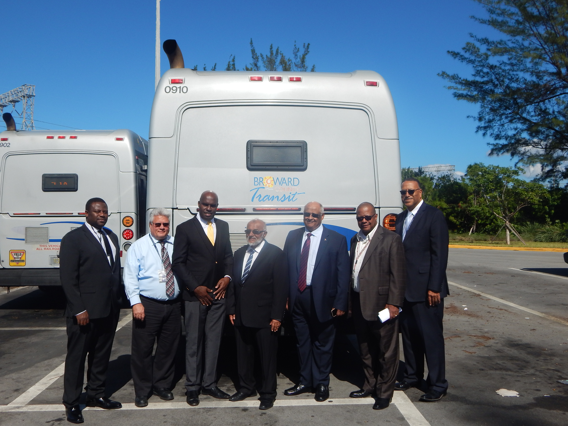 (L-R) Alex Linton, Barbados Transit Authority director; James Fourcade, BCT director of maintenance; Michael Lashley, Barbados minister of Transportation; Abdul Pandor, Barbados Transport Authority chairman; Barbados Consul General Colin Mayers; Corwin Gibbs, BCT director of bus operations; and Chris Walton, director of Broward County Transportation.
