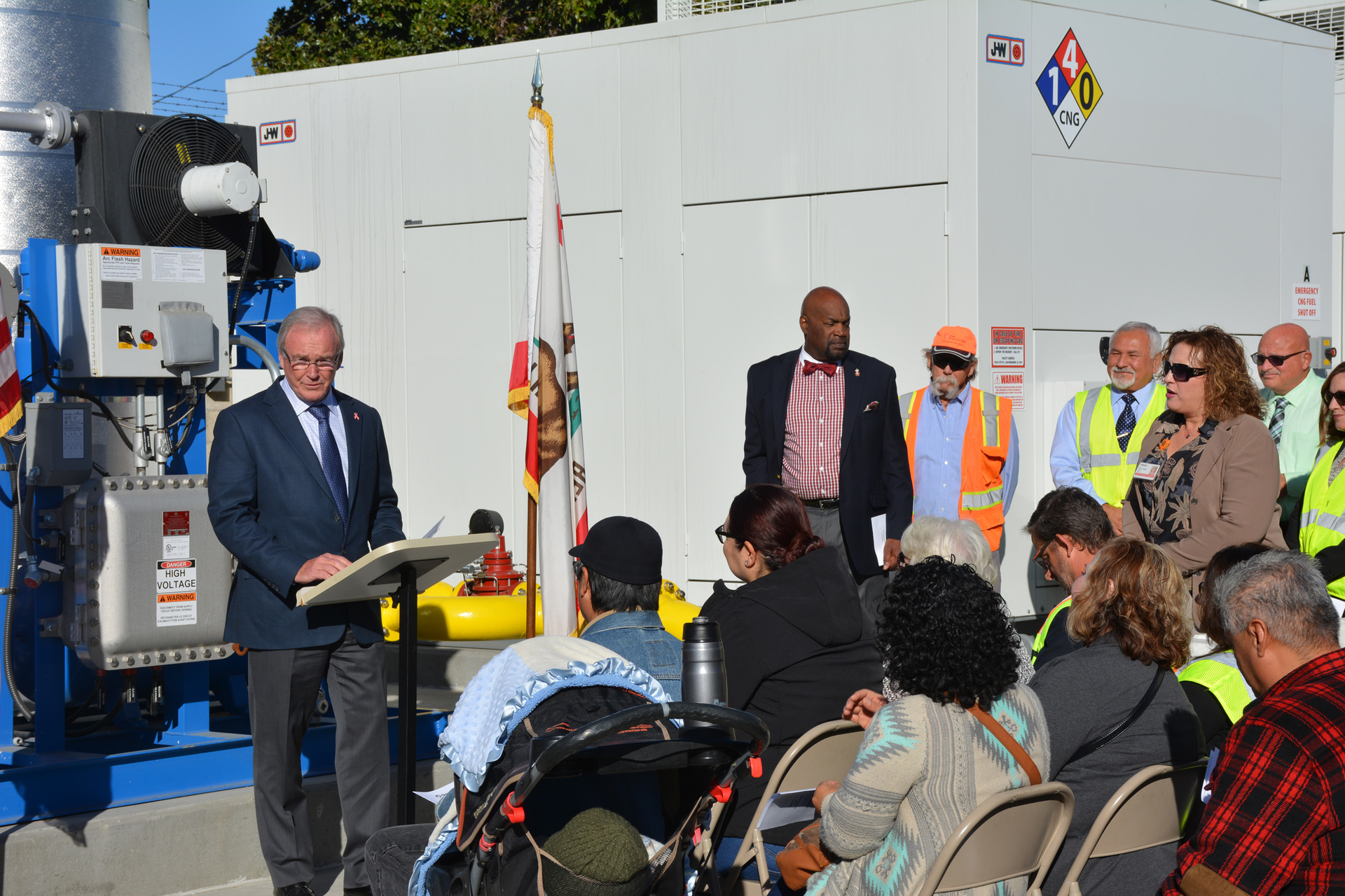 Omnitrans CEO/General Manager P. Scott Graham addresses crowd at CNG fueling system completion.