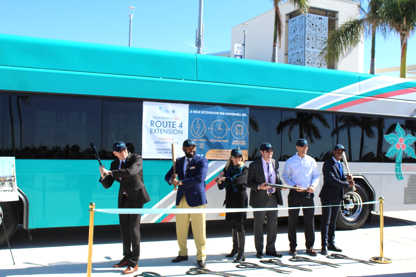 From left to right: Palm Beach County Deputy Administrator Jon Van Arnam, Palm Tran Executive Director Clinton B. Forbes, Palm Beach County Mayor Melissa McKinlay, Palm Beach County Assistant Administrator Todd Bonlarron, Ballpark of the Palm Beaches General Manager Brady Ballard and Darren Romelus an aide to Vice Mayor Mack Bernard.