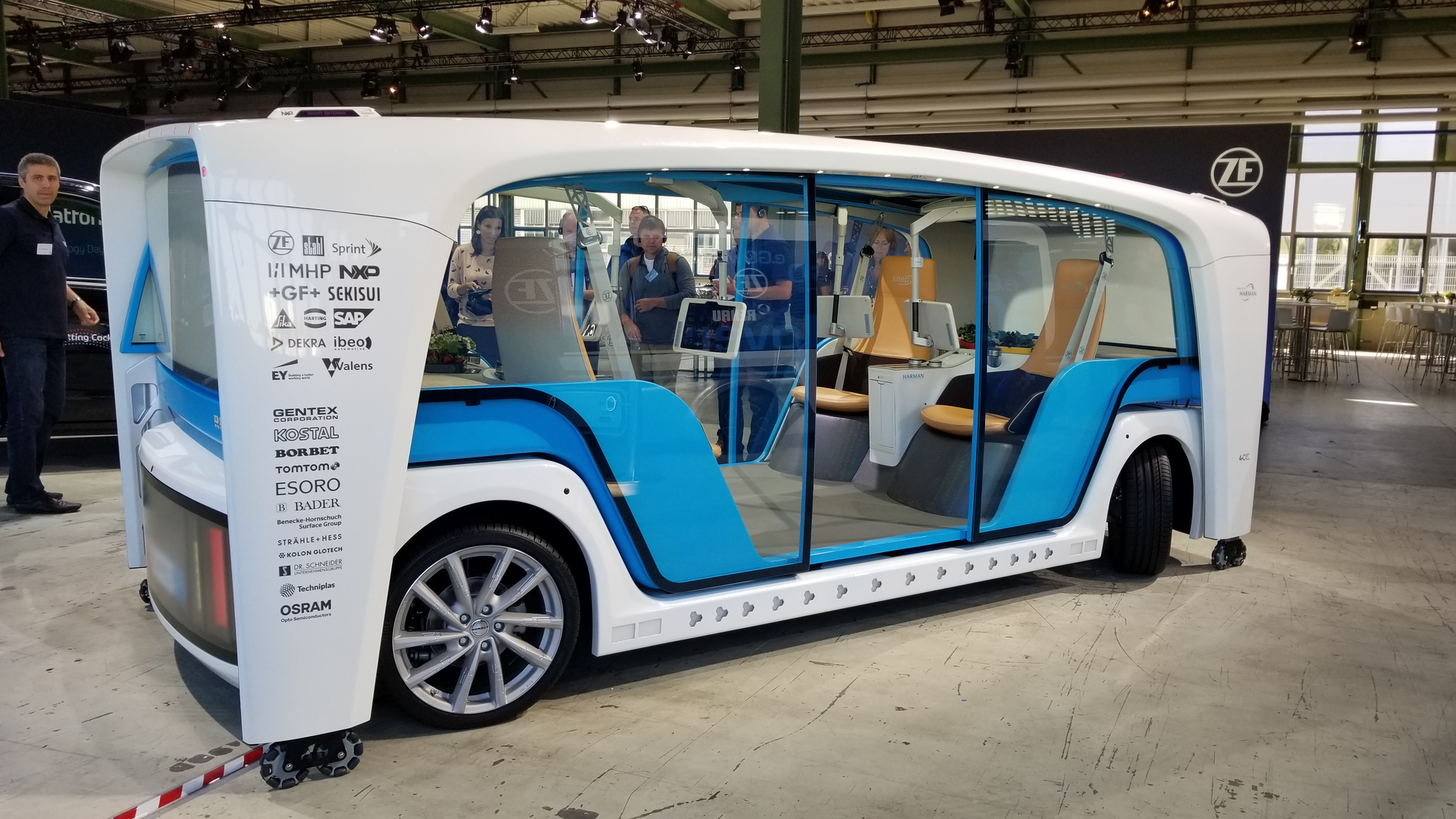 ZF's concept car uses a removable, autonomous, shared chassis, the most expensive part of auto-ownership. People could pay a monthly fee to utilize on-demand chassis and while your pod is parked, the chassis can drive away to do other tasks.