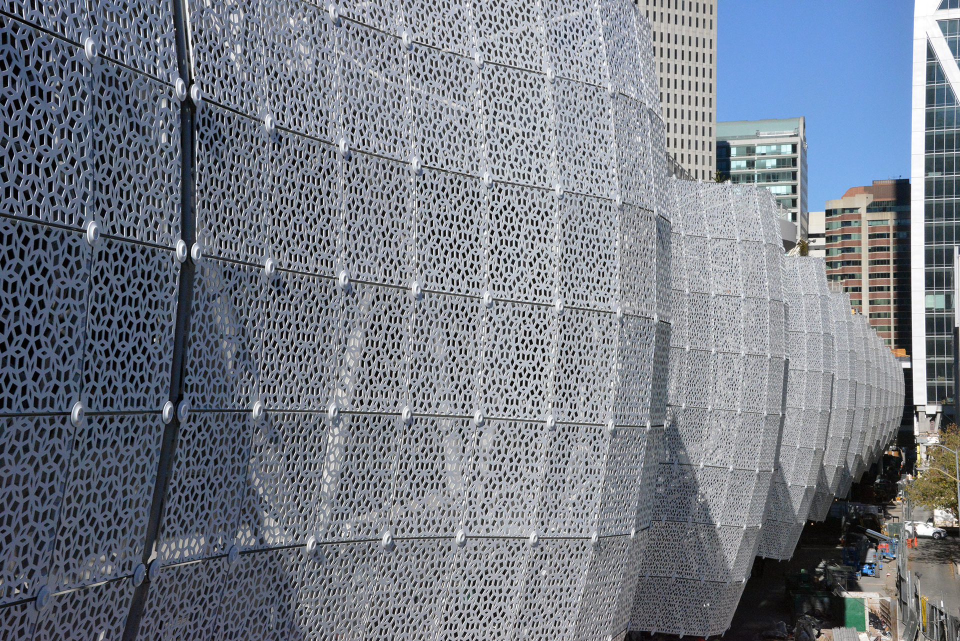 The Transit Center's airy metal skin puts a pretty face on a work horse third-floor bus deck that will accommodate buses operated by several regional transit systems.