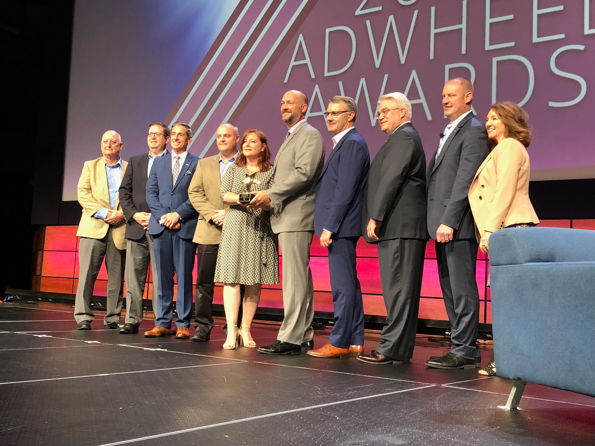 Pictured at the Sept. 24 award ceremony during the 2018 APTA Annual Meeting in Nashville are from left: Lee Kemp, MCI Regional Sales Vice President Public Sector; Scott Robertson, NFI Parts Vice President of Customer Service; Lou Quaglia, MCI Regional Sales Vice President Public Sector; Dustin Caldwell, NFI Parts Marketing Manager; Vicki Bowman, MCI Marketing Manager; Tom Wagner, MCI Vice President of Public Sector; Patrick Scully, MCI Executive Vice President of Sales and Marketing; and APTA presenters David Stackrow, Capital District Transportation Authority and APTA Chair; J.C. Vannatta, TriMet; and Pauletta Tonilas, LA Metro.