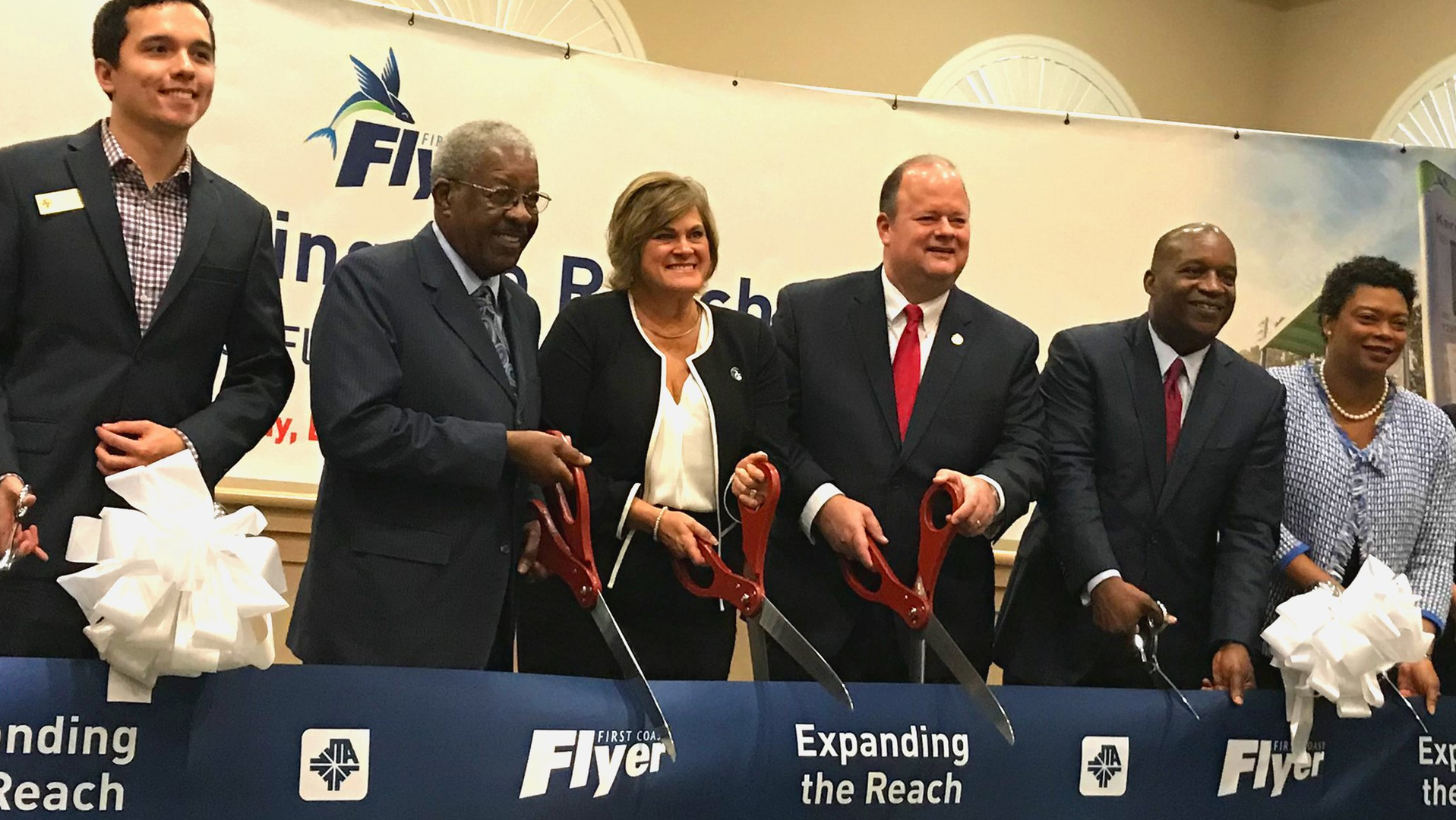 FTA Acting Administrator K. Jane Williams, center, joins representatives from the Jacksonville Transportation Authority at the launch of First Coast Flyer Bus Rapid Transit Red Line.