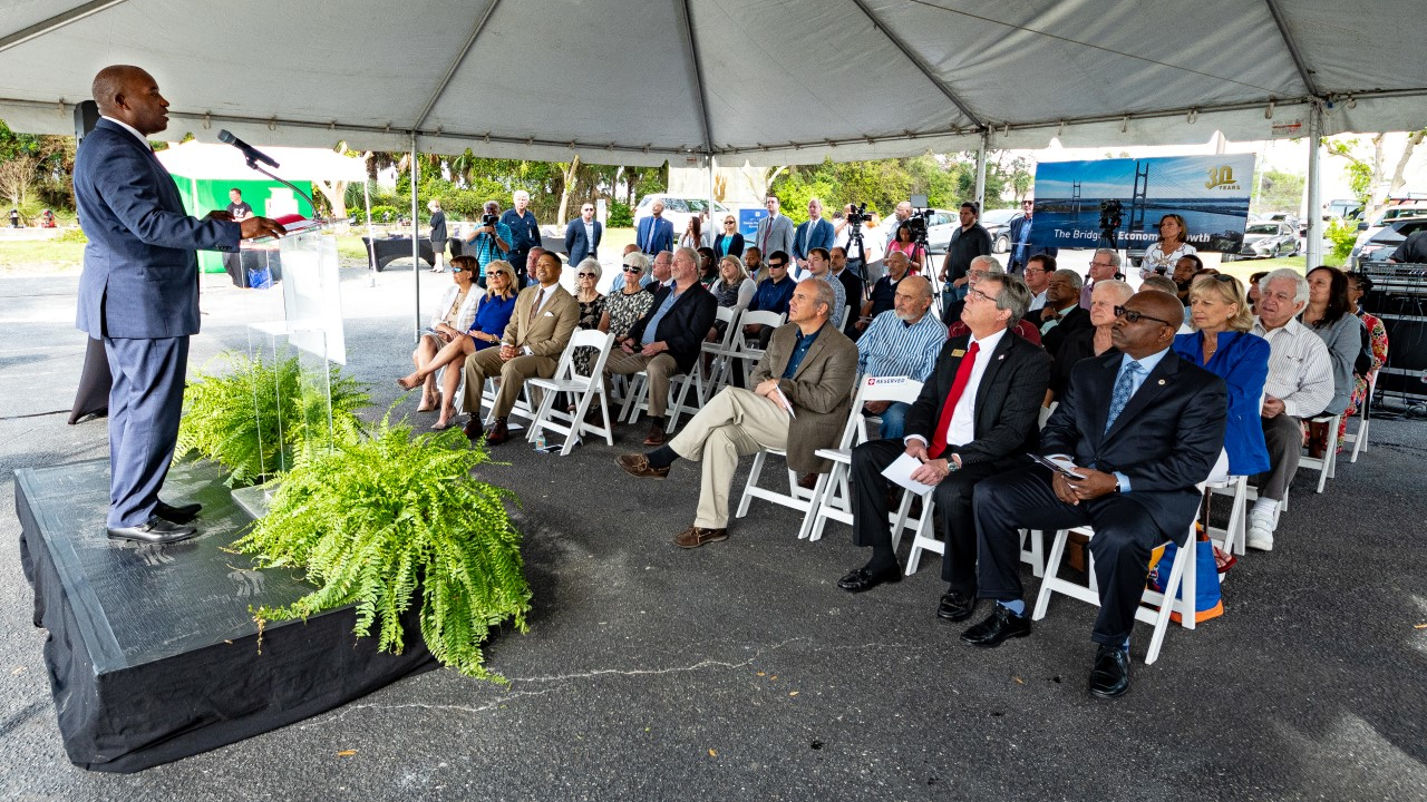 JTA CEO Nathaniel P. Ford Sr., left, remarking on the significance of the 30th Anniversary of the completion of the Dames Point Bridge.