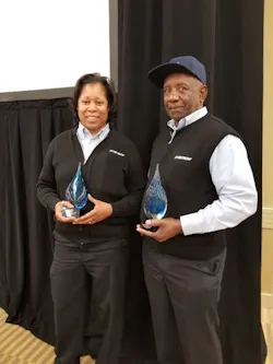 Raimey and Williams accepting their awards. Raimey and Williams accepting their awards.