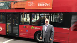 Paul stands by one of the iconic Red Transport for London public buses. Paul stands by one of the iconic Red Transport for London public buses.